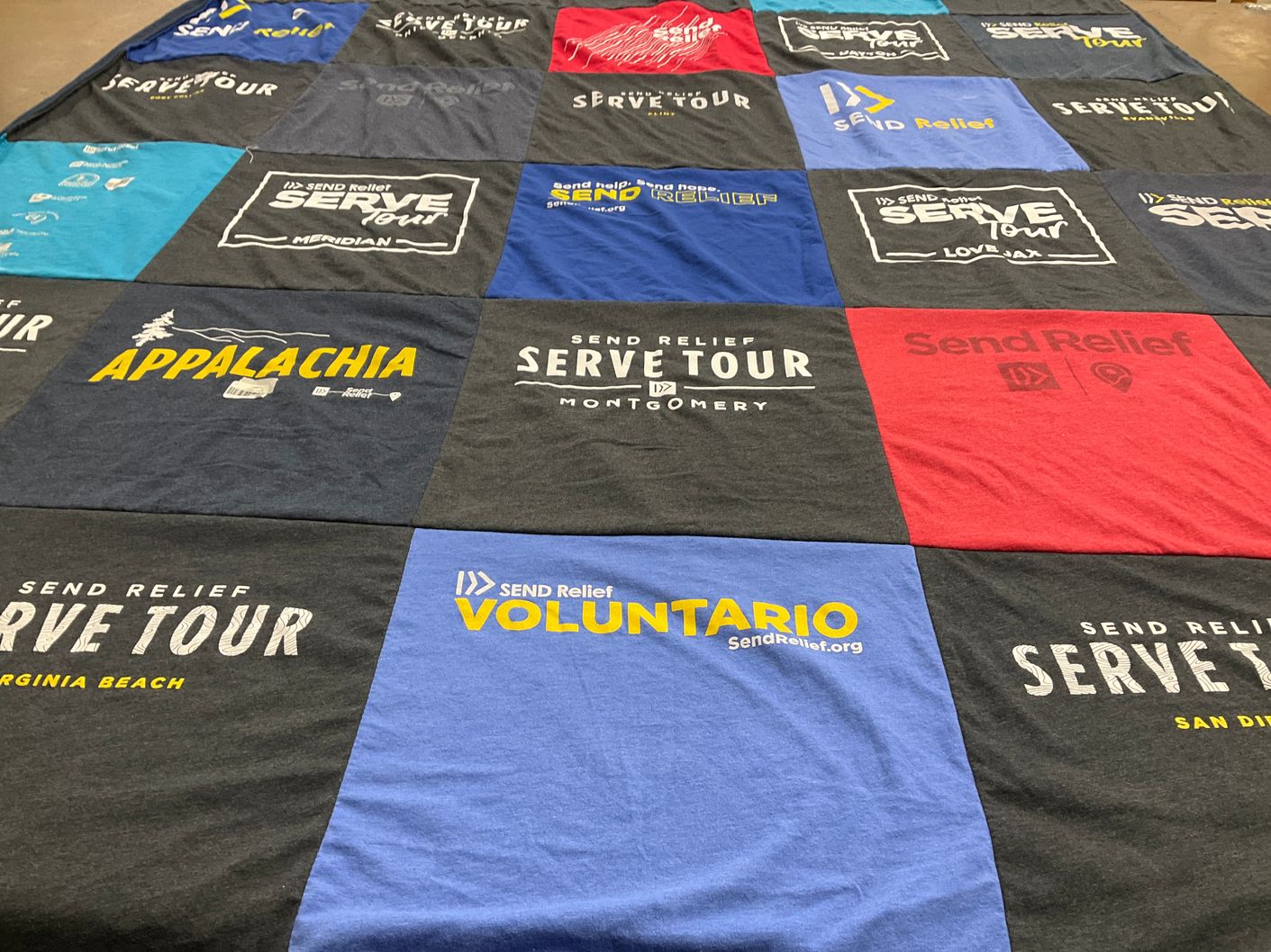 T-shirt quilt with volunteering, community service themes by Christina from KY