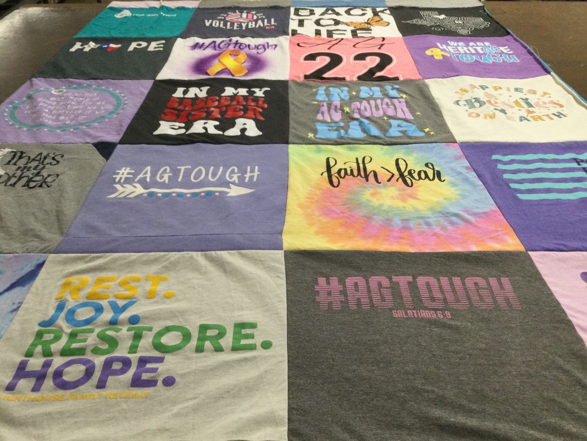 T-shirt quilt with sports, faith themes by Leslie from TX