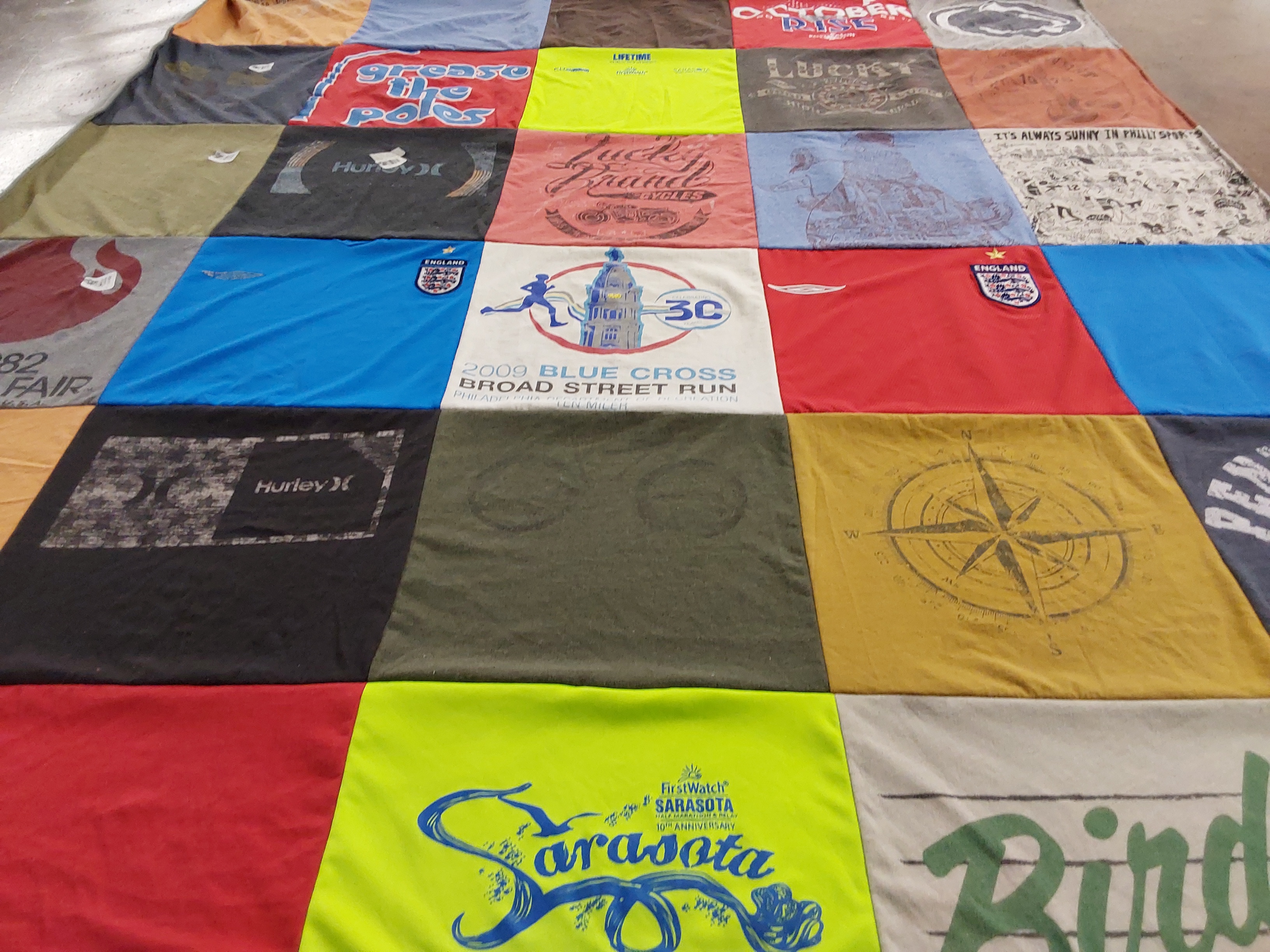 T-shirt quilt with running, outdoor activities themes by Jessica from PA