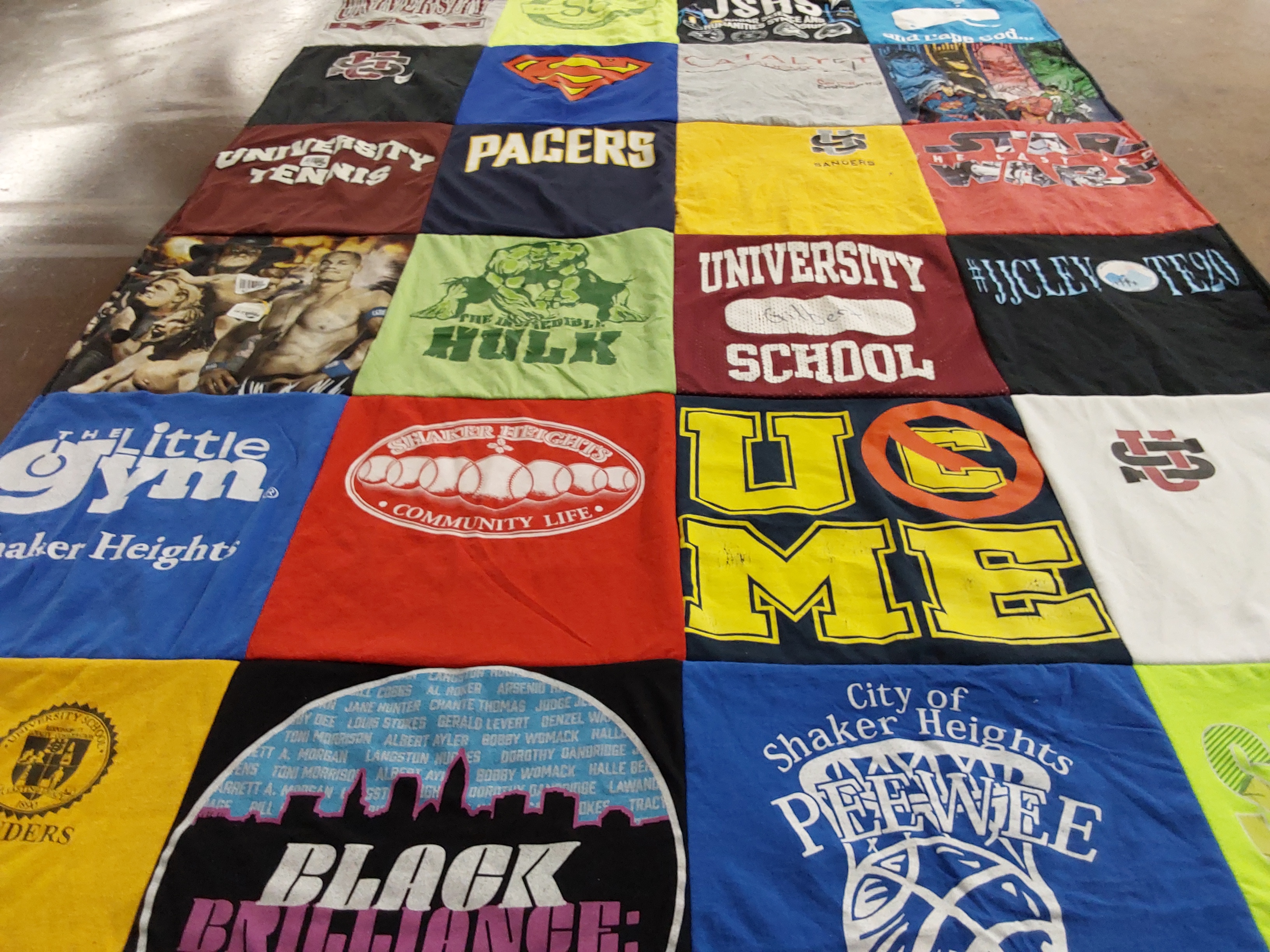 T-shirt quilt with sports, fitness themes by Michele from OH