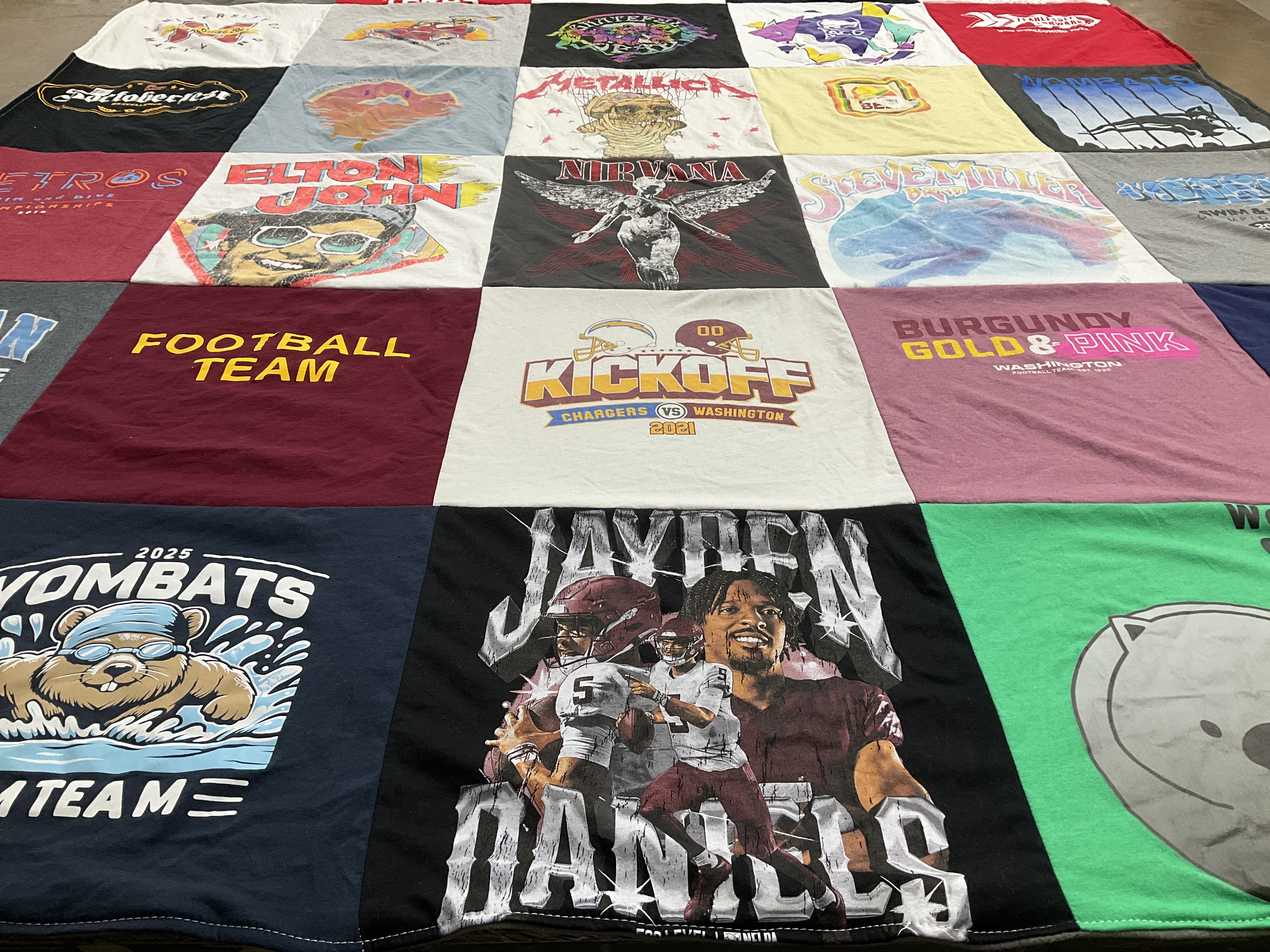 T-shirt quilt with music, football themes by Mitsue from MD