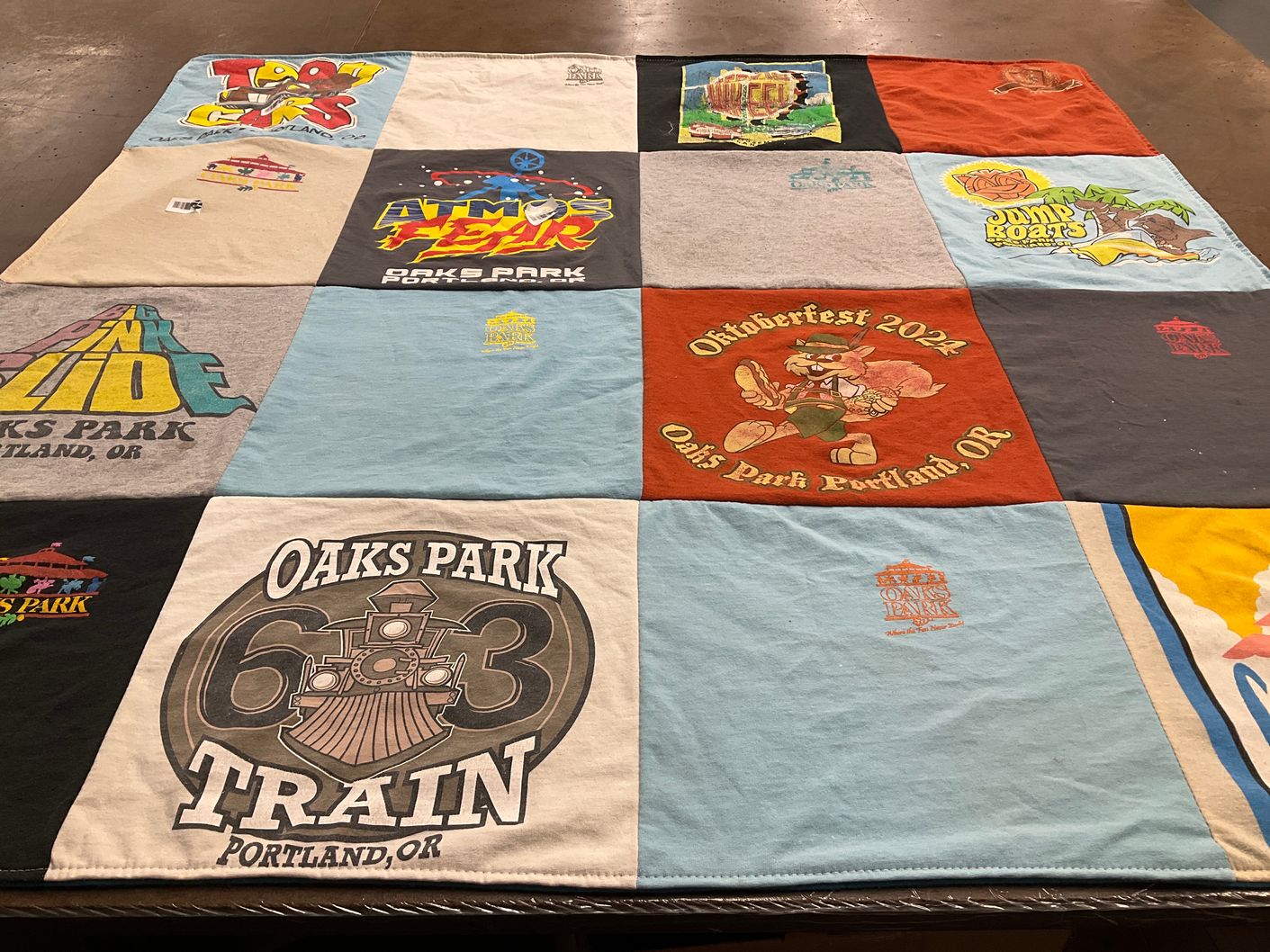 T-shirt quilt with amusement parks, festivals themes by Sarah from OR
