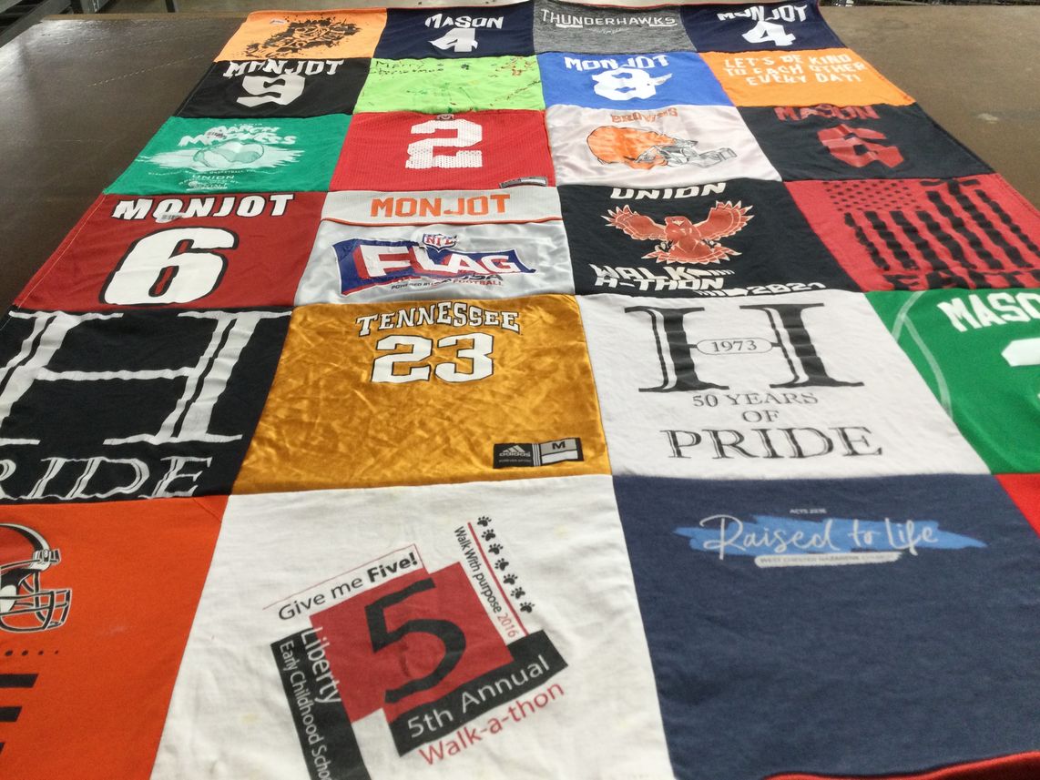 T-shirt quilt with sports, community events themes by Colleen from OH
