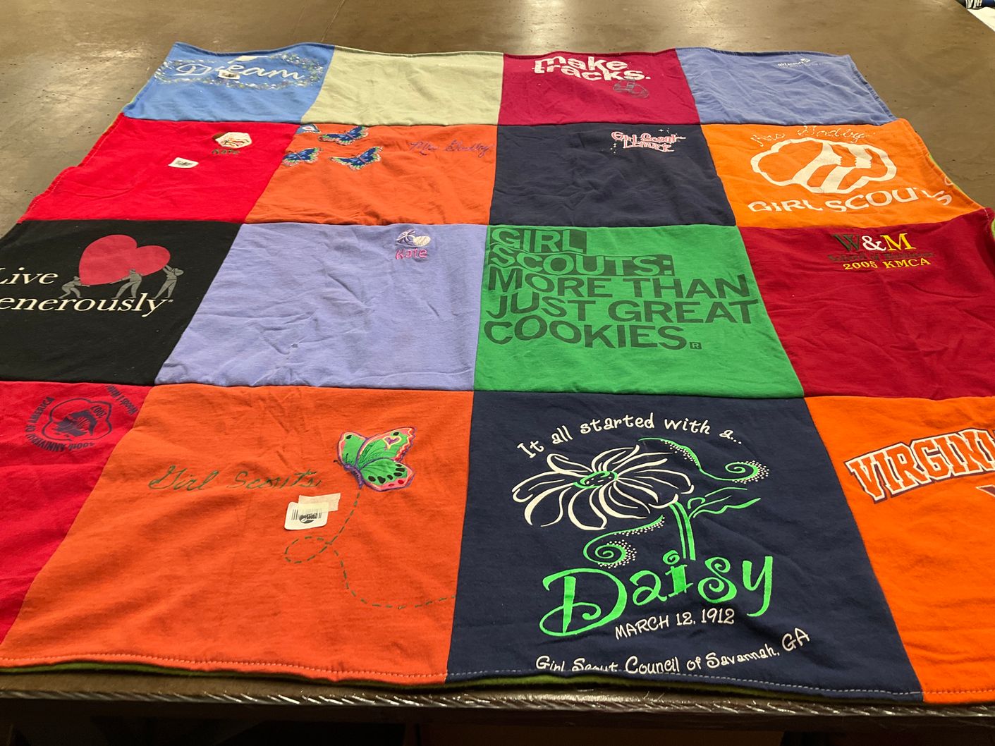 T-shirt quilt with girl scouts, community involvement themes by Amy from AZ
