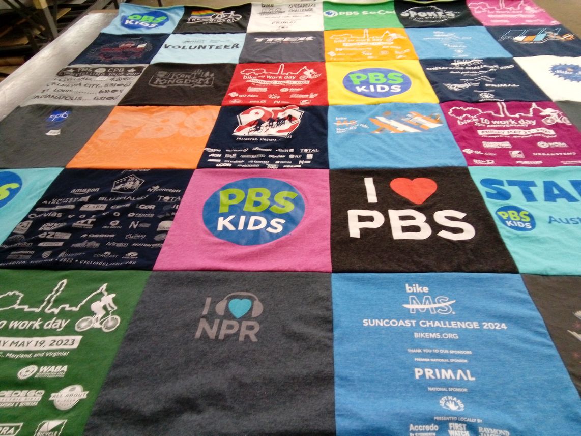 T-shirt quilt with cycling, volunteering themes by Devon from VA