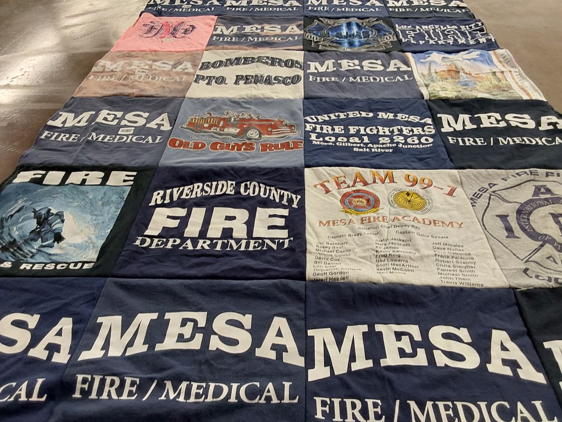 T-shirt quilt with firefighting, emergency services themes by Mari from AZ