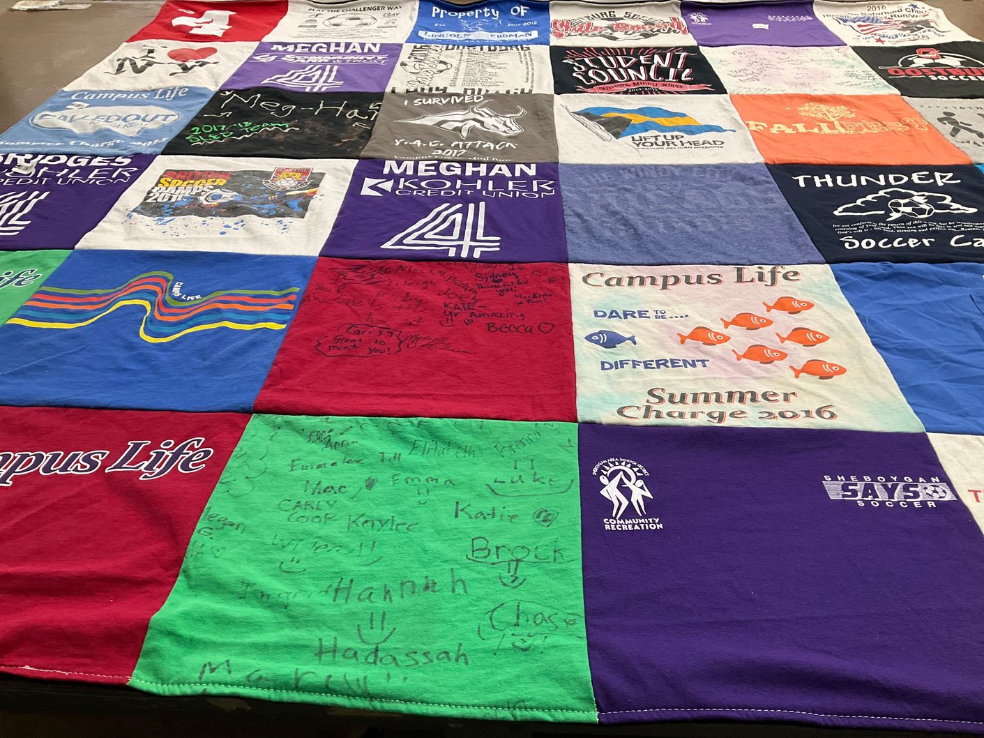 T-shirt quilt with soccer, community activities themes by Amy from WI