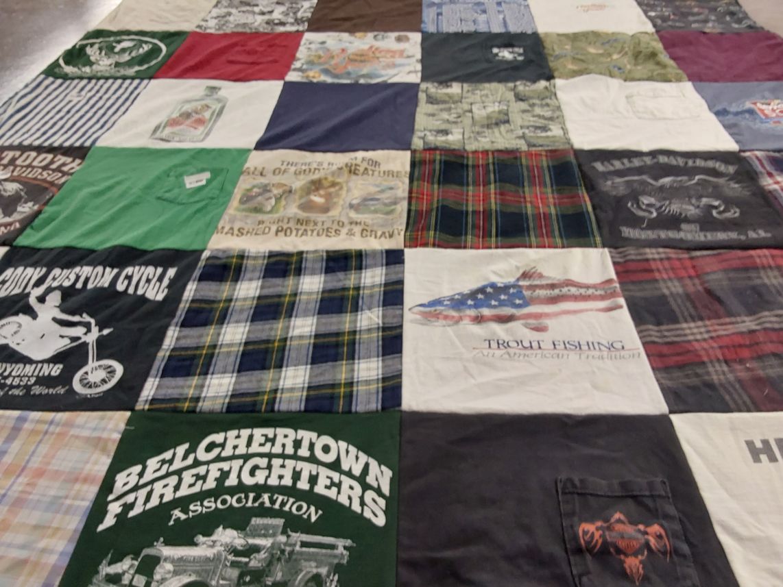 T-shirt quilt with fishing, motorcycling themes by Cheryl from CT