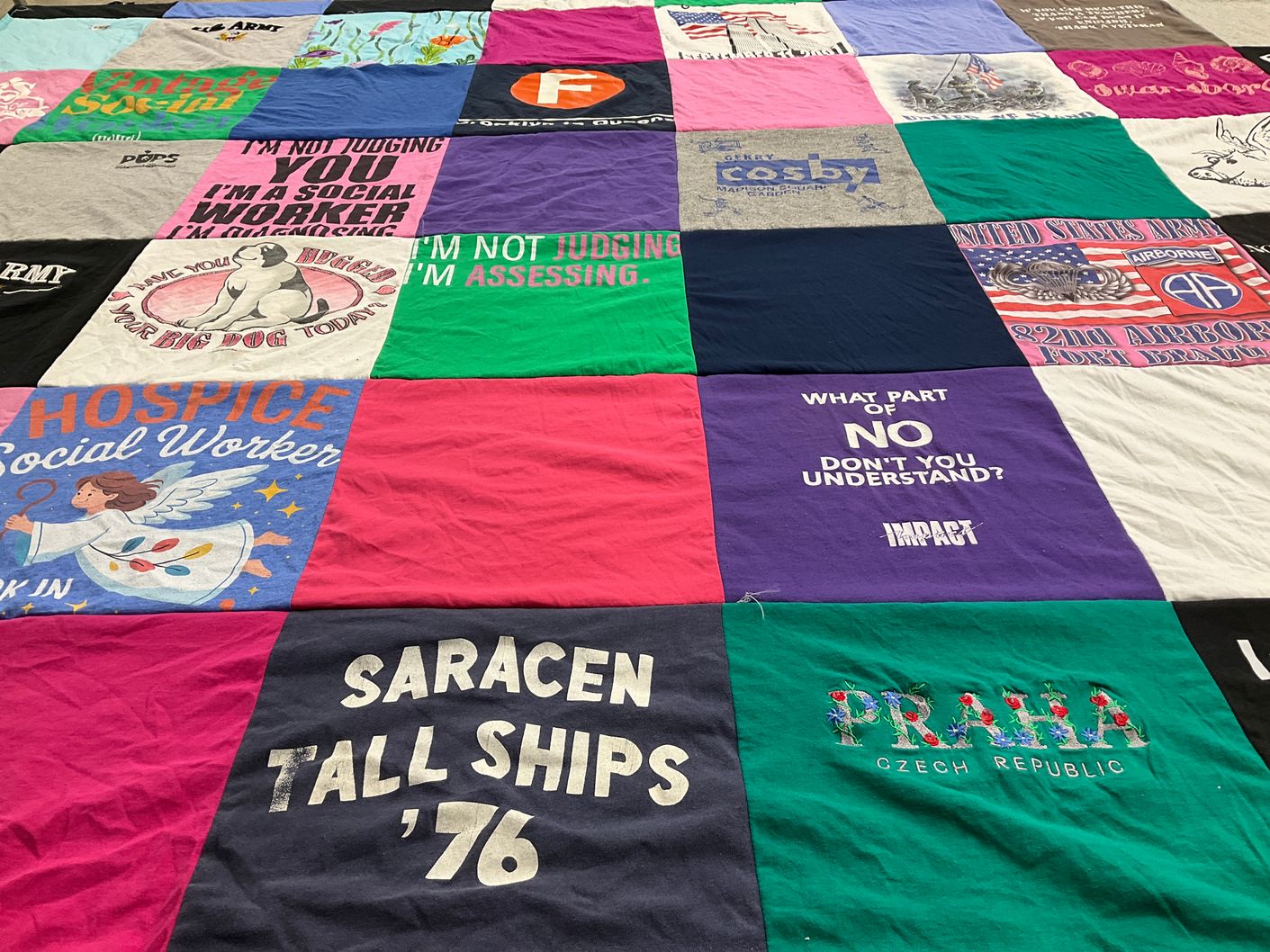 T-shirt quilt with social work themes by Diane from NC