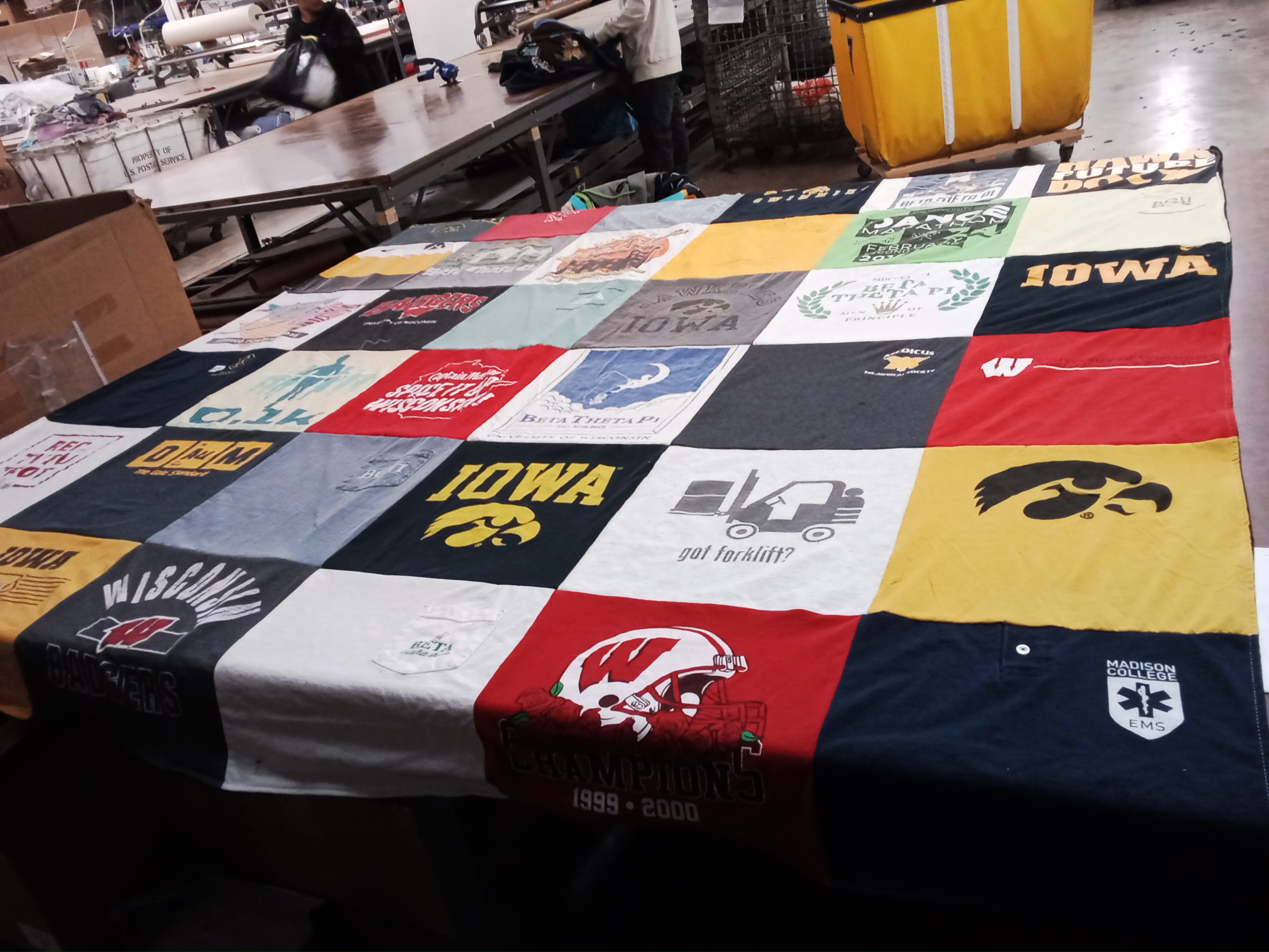 T-shirt quilt featuring university of iowa, university of wisconsin by Mary from WI