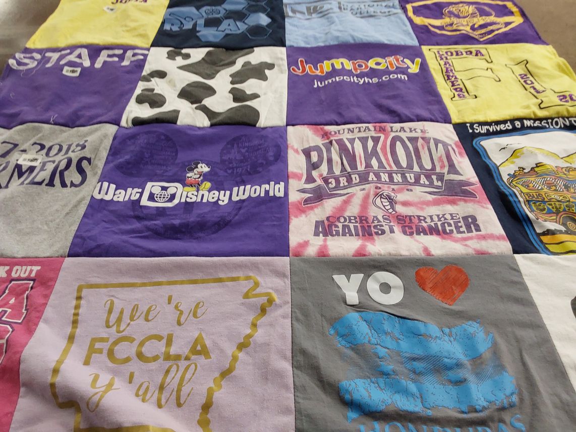 T-shirt quilt with cancer awareness, disney themes by Lora from AR