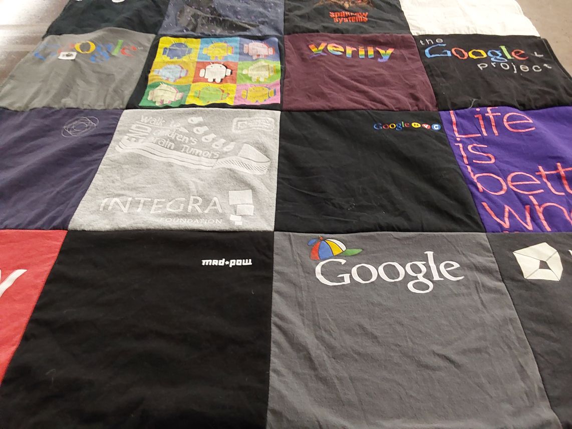 T-shirt quilt with technology, development themes by Jennifer from MA