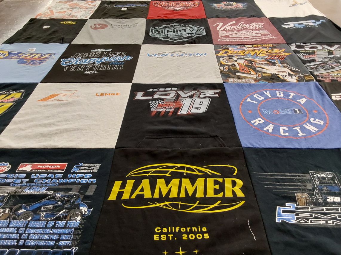 T-shirt quilt with auto racing, motorsports themes by Jesshill from CA