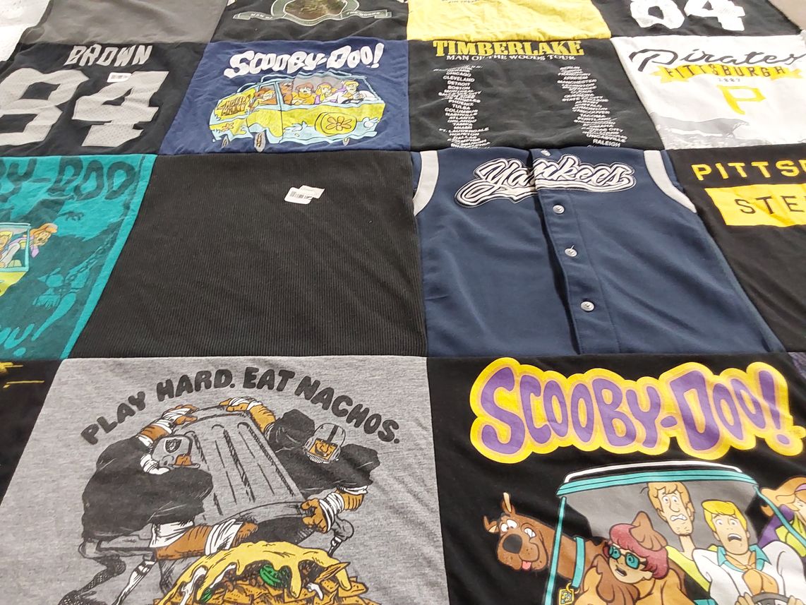 T-shirt quilt with cartoons, sports themes by Sharon from NV