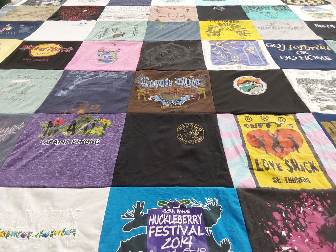 T-shirt quilt with travel, food themes by Mary from MT