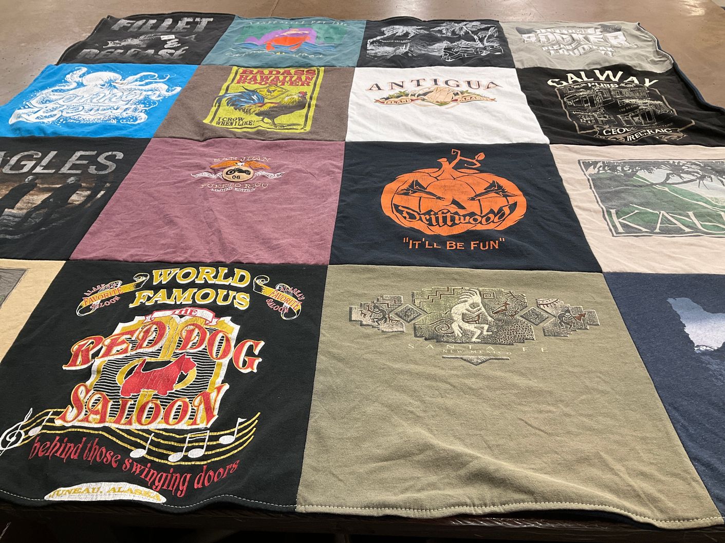 T-shirt quilt with travel, music themes by Lila from OR