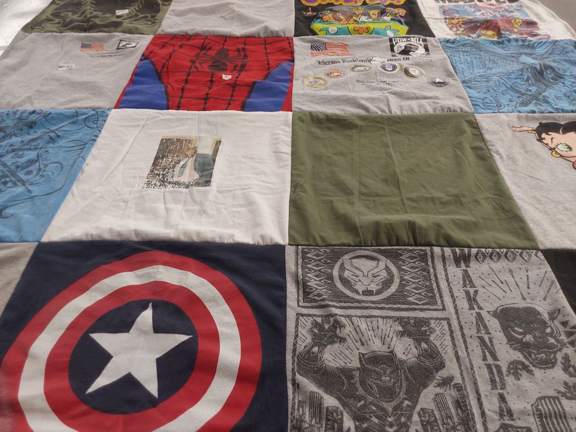 T-shirt quilt with comics, superheroes themes by Brianna from NC