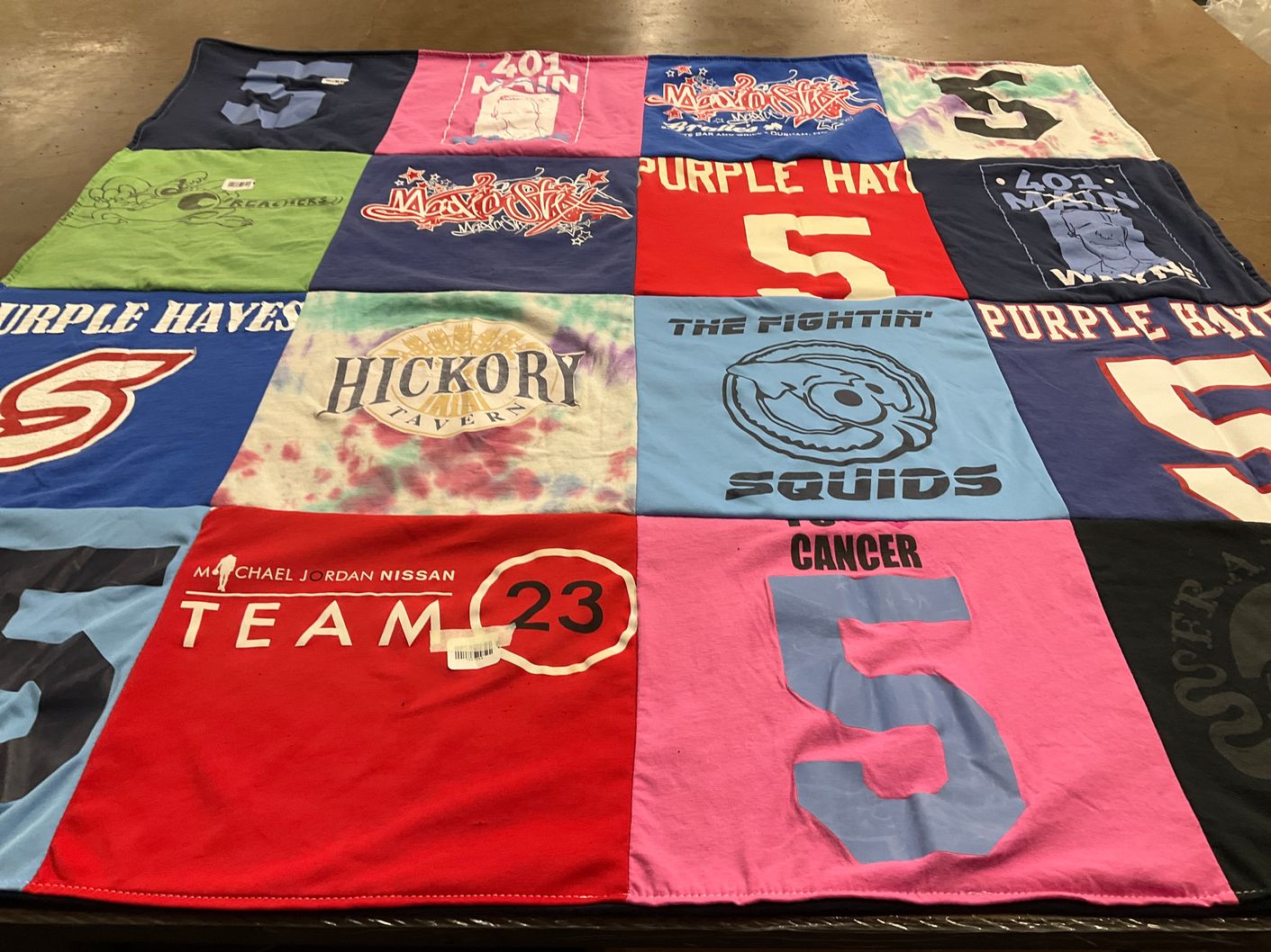 T-shirt quilt with sports, food themes by Amber from NC