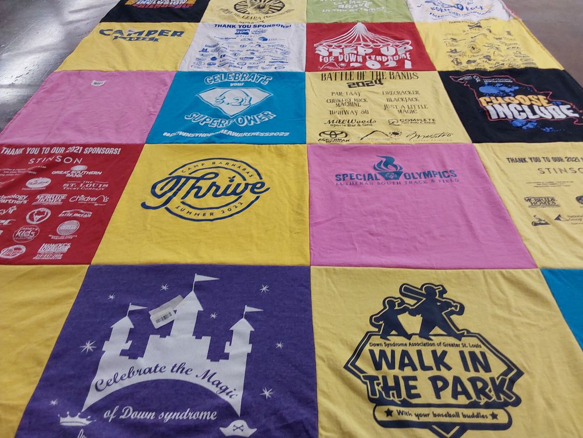 T-shirt quilt with down syndrome advocacy, special olympics themes by Stacey from MO
