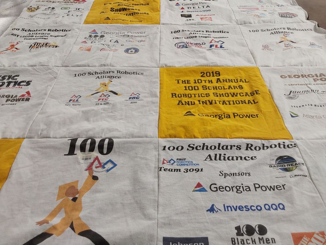 T-shirt quilt with robotics, engineering themes by Afua from GA