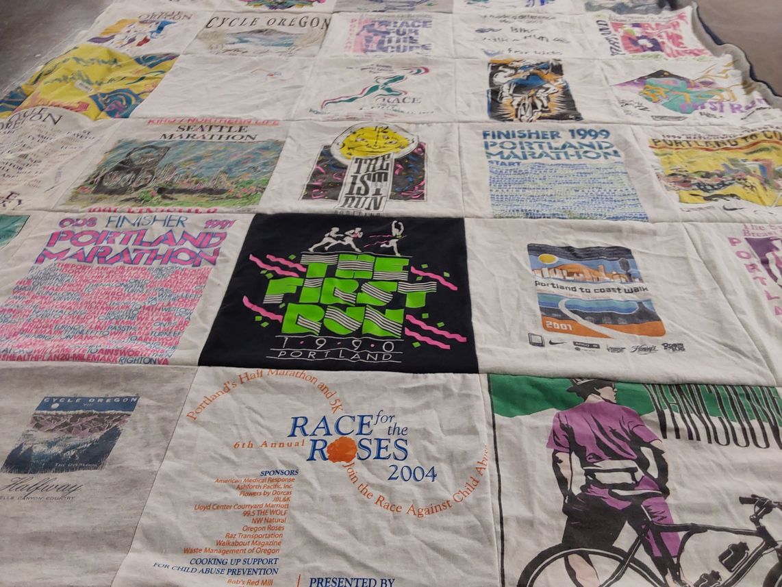 T-shirt quilt with running, cycling themes by kris from OR