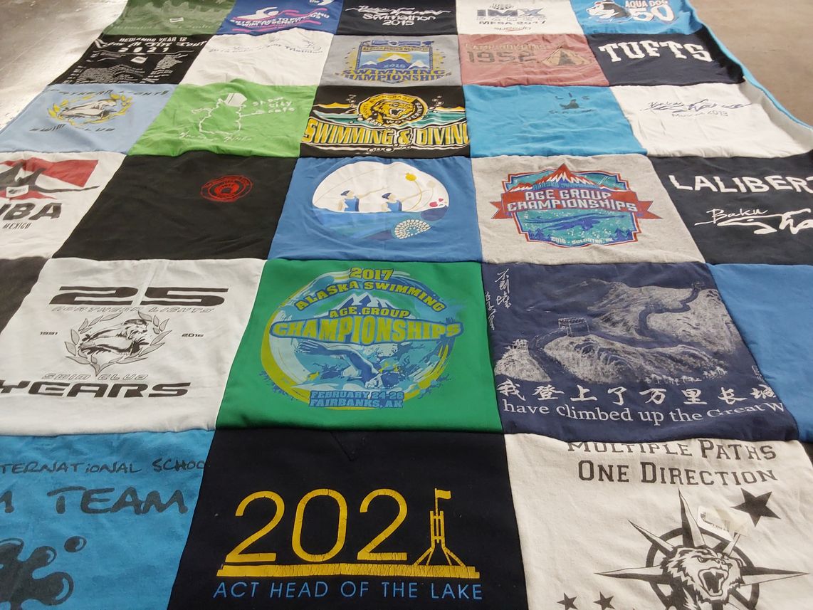 T-shirt quilt featuring alaska swimming team by Ena from AK