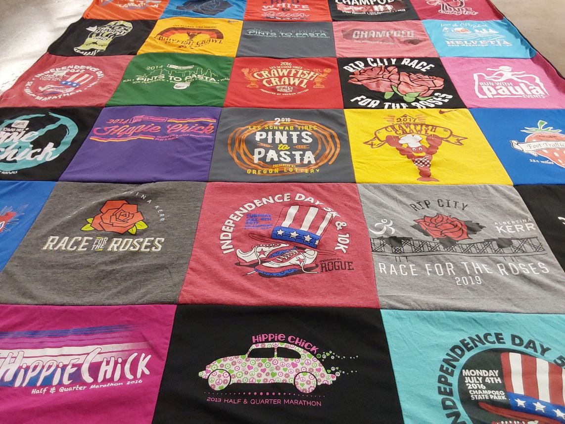 T-shirt quilt with marathons, running themes by Laura from OR