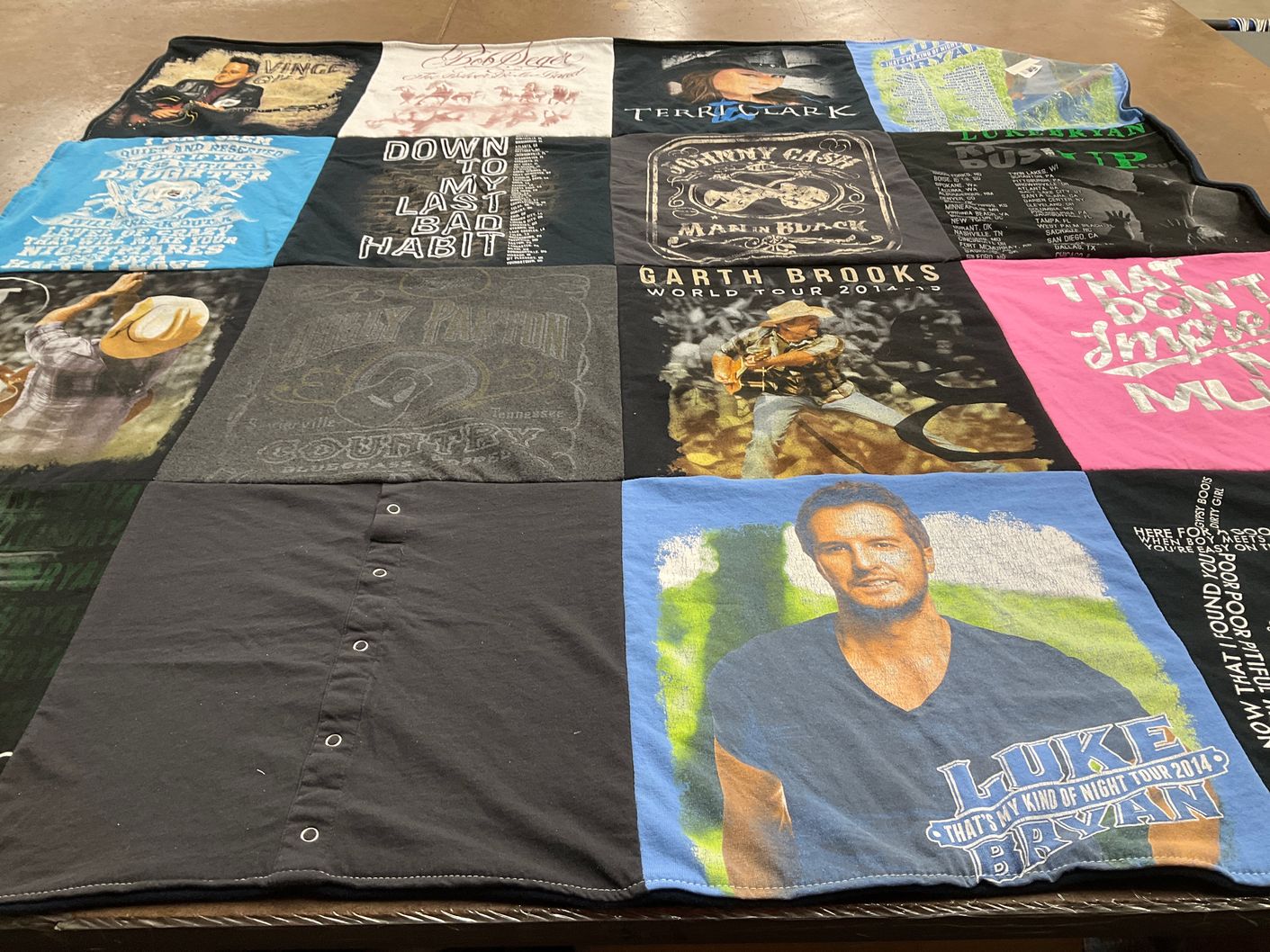 T-shirt quilt with country music themes by Bridget from CA