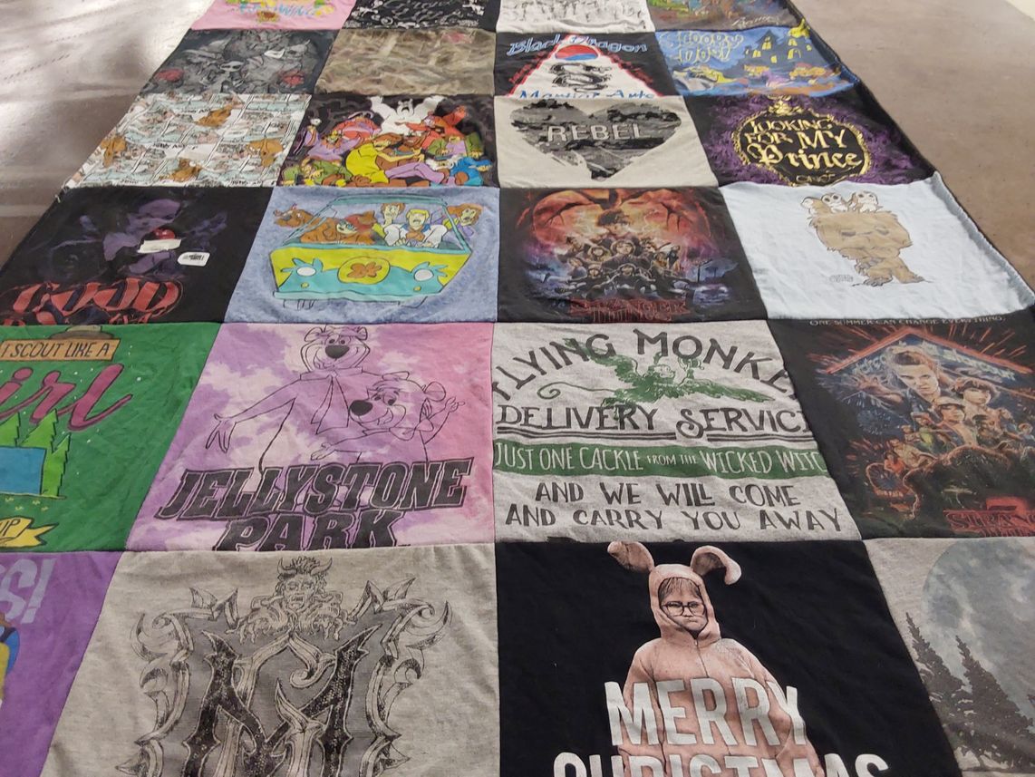 T-shirt quilt with cartoons, movies themes by Amber from MI