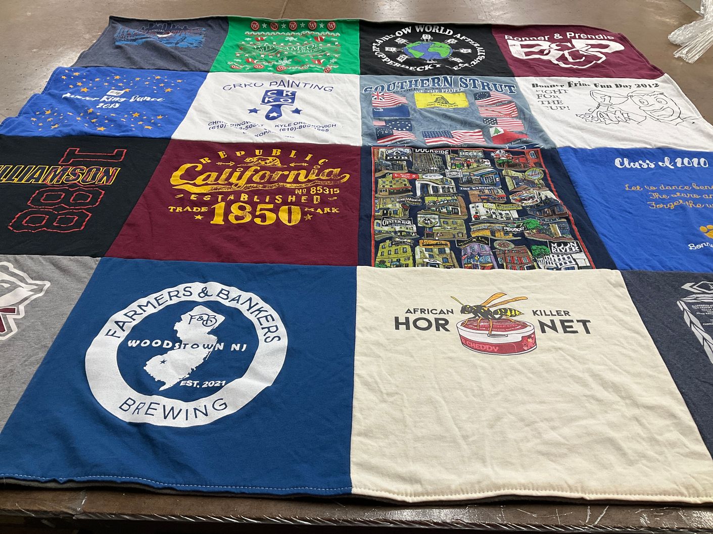 T-shirt quilt with brewing, athletics themes by Ava from PA