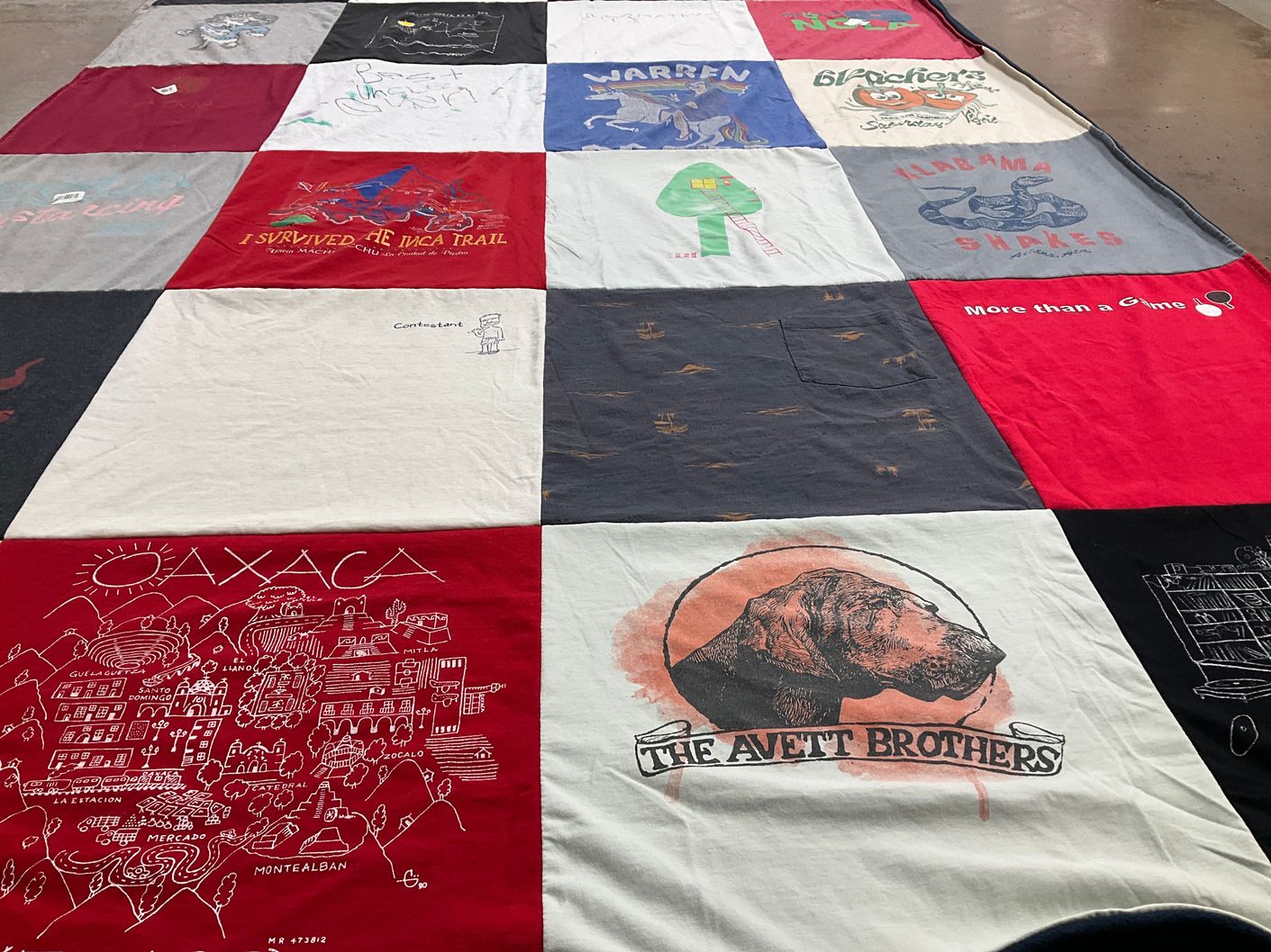 T-shirt quilt with travel, music themes by Adam from CA
