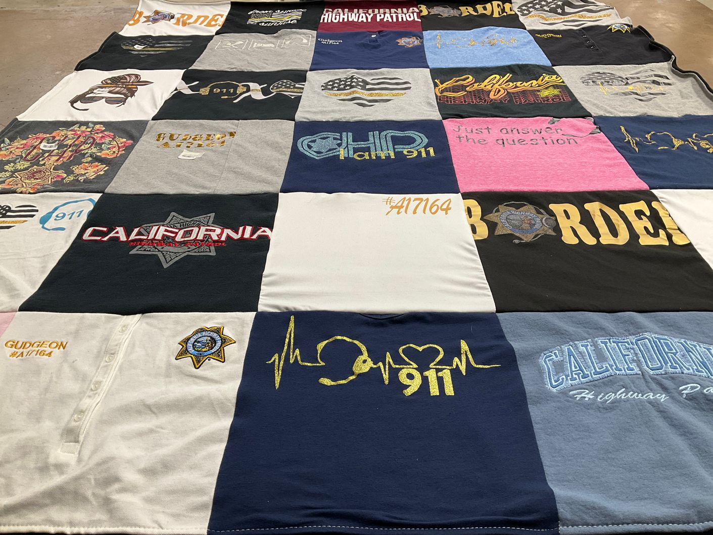 T-shirt quilt with law enforcement, public service themes by Holly from CA