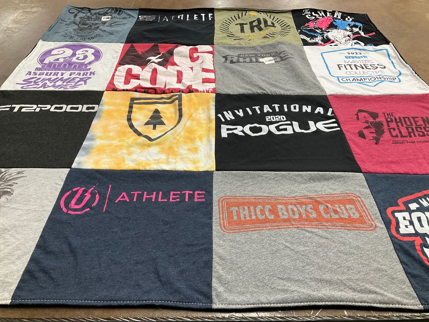 T-shirt quilt with fitness, athletics themes by Roland from NJ