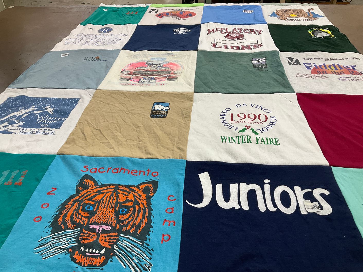 T-shirt quilt featuring mcclatchy lions by Maryal from CA