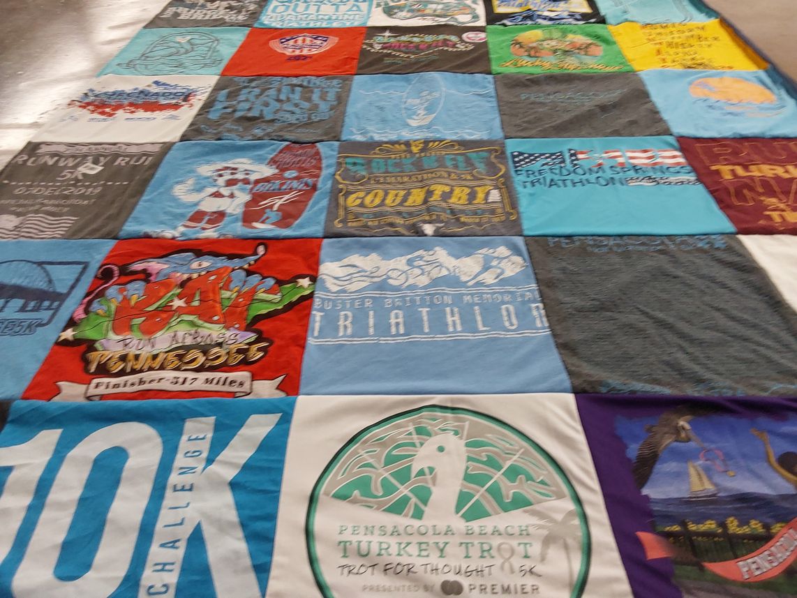 T-shirt quilt with running, triathlons themes by Robert from FL