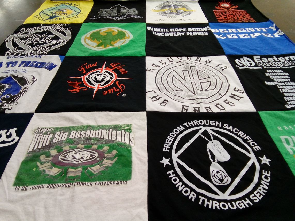 T-shirt quilt with recovery support, mental health themes by Lydia from CA