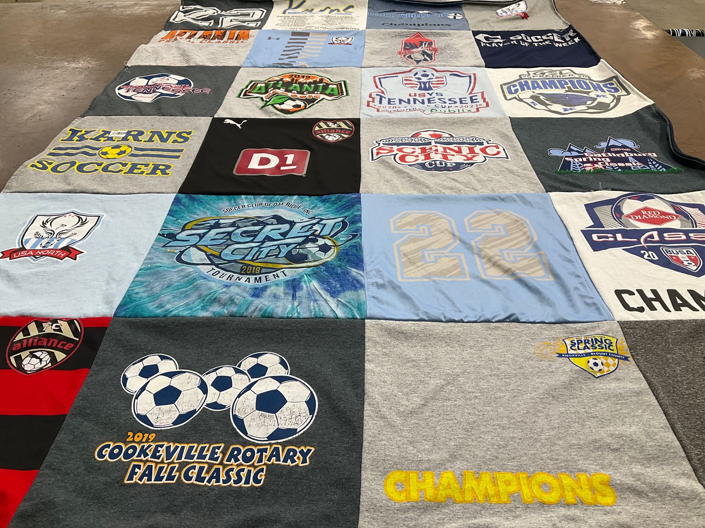 T-shirt quilt with soccer, tournaments themes by Christine from TN