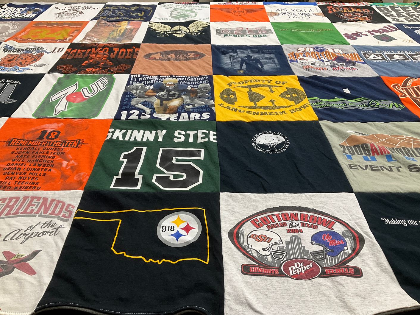 T-shirt quilt featuring oklahoma state cowboys, university of mississippi rebels by Keith from OK