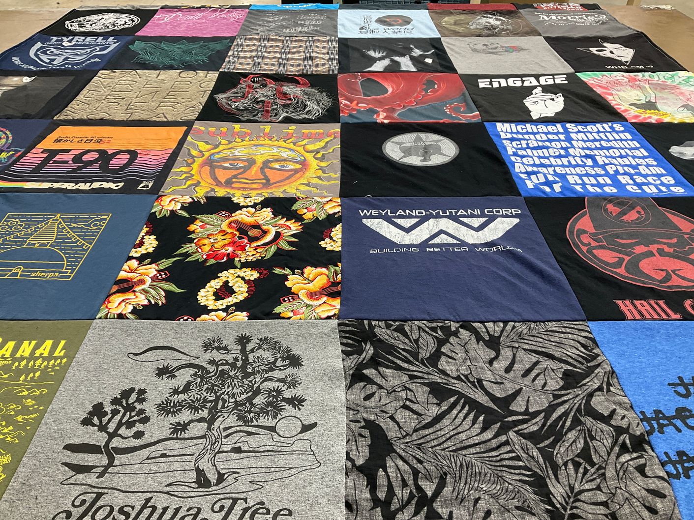 T-shirt quilt with graphic design, pop culture themes by Eric from CO