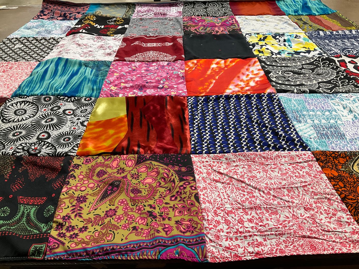 T-shirt quilt with quilting, textiles themes by Deann from PA