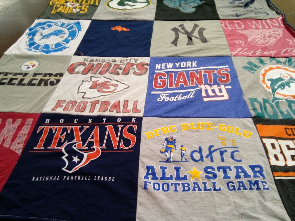 T-shirt quilt featuring kansas city chiefs football, new york giants football by Jennifer from TN