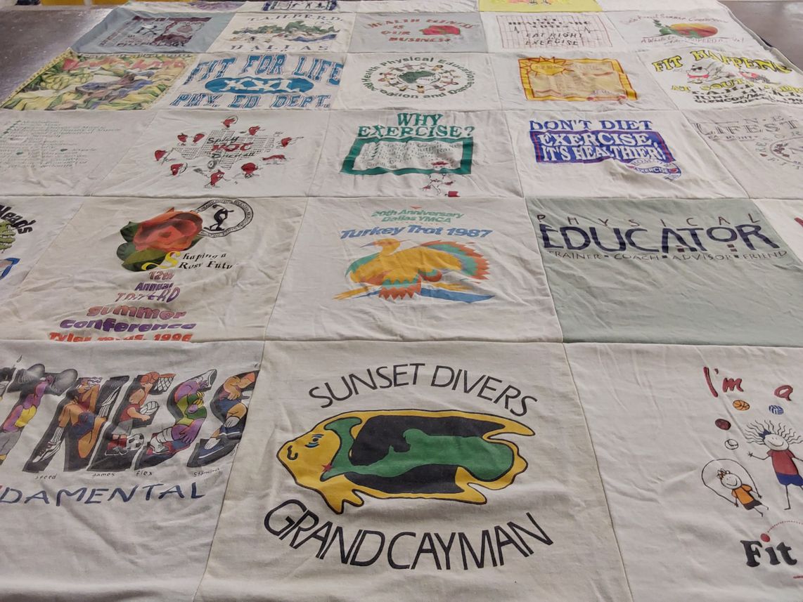 T-shirt quilt with exercise, fitness themes by Renee from TX