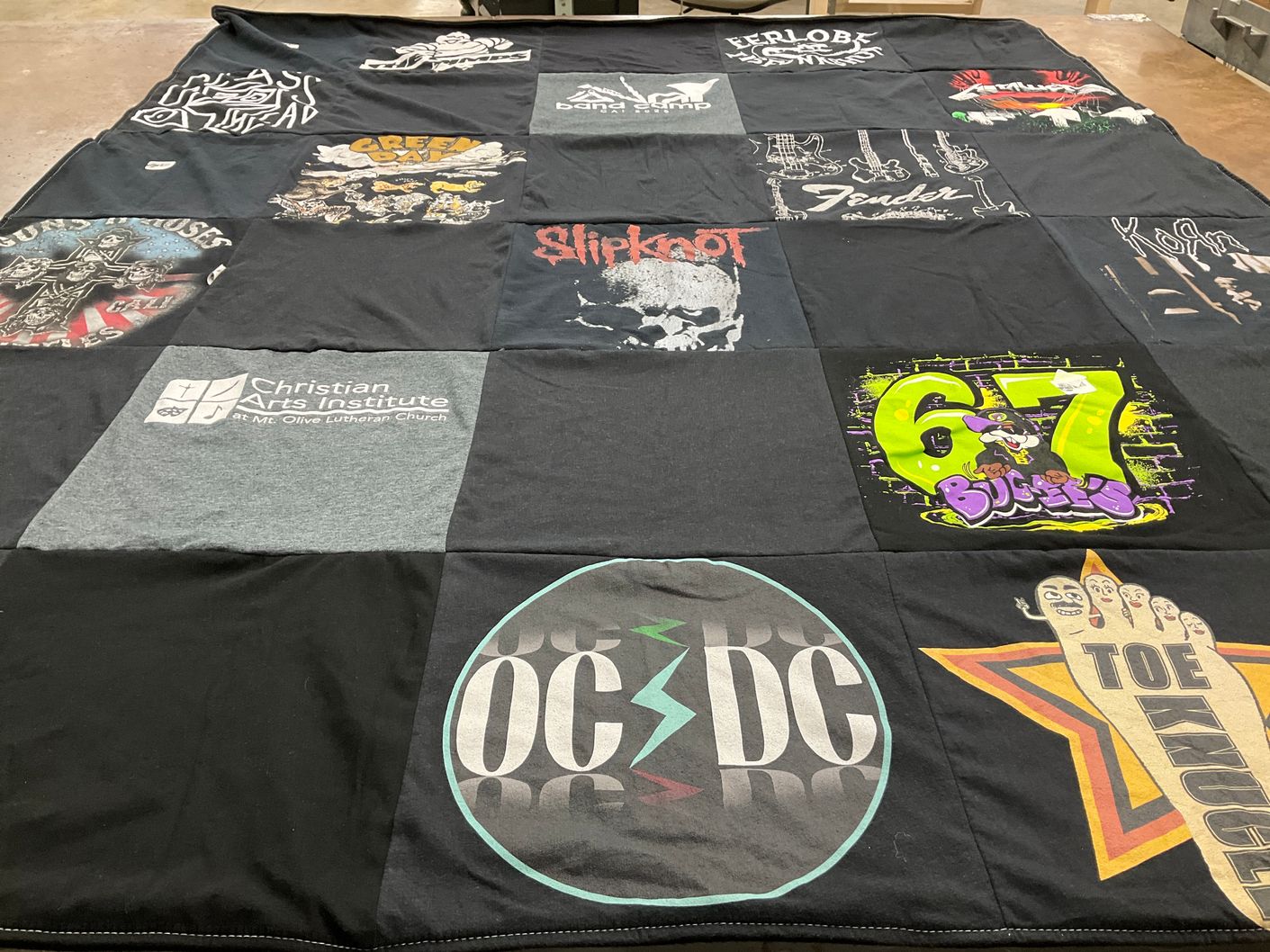 T-shirt quilt with music, art themes by Ann from IL