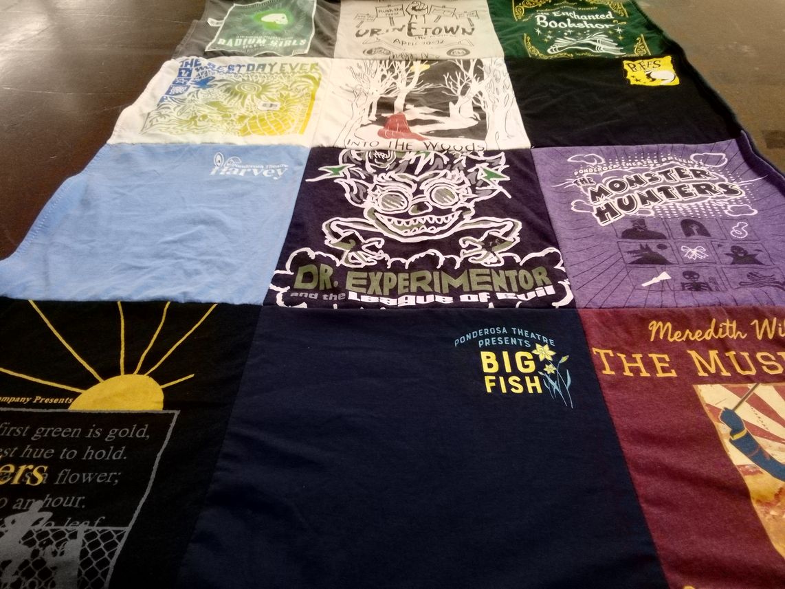 T-shirt quilt with theatre, performance themes by Judi from CO