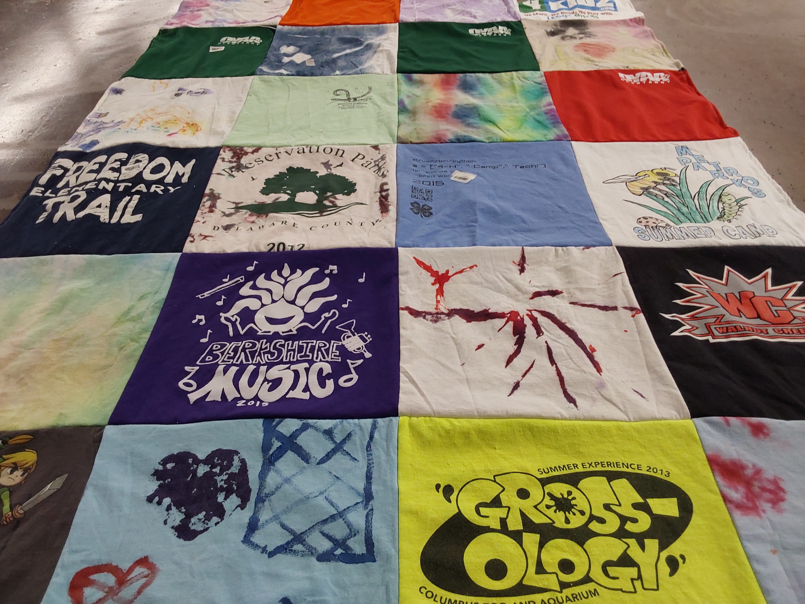 T-shirt quilt with music, camps themes by Kathleen from OH