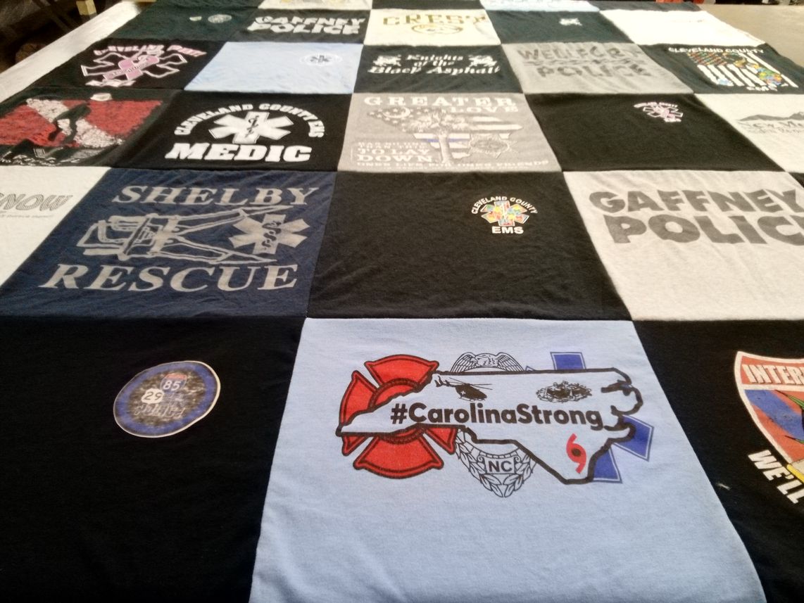 T-shirt quilt with emergency services, law enforcement themes by Roc from NC