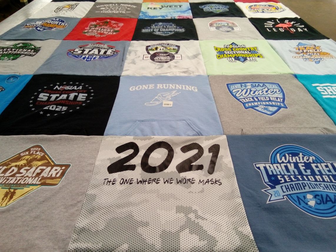 T-shirt quilt with running, track and field themes by Jacinda from NJ