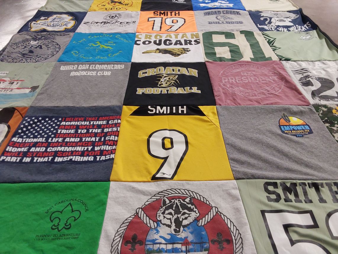 T-shirt quilt featuring croatan cougars, broad creek bulldogs by Kori from NC