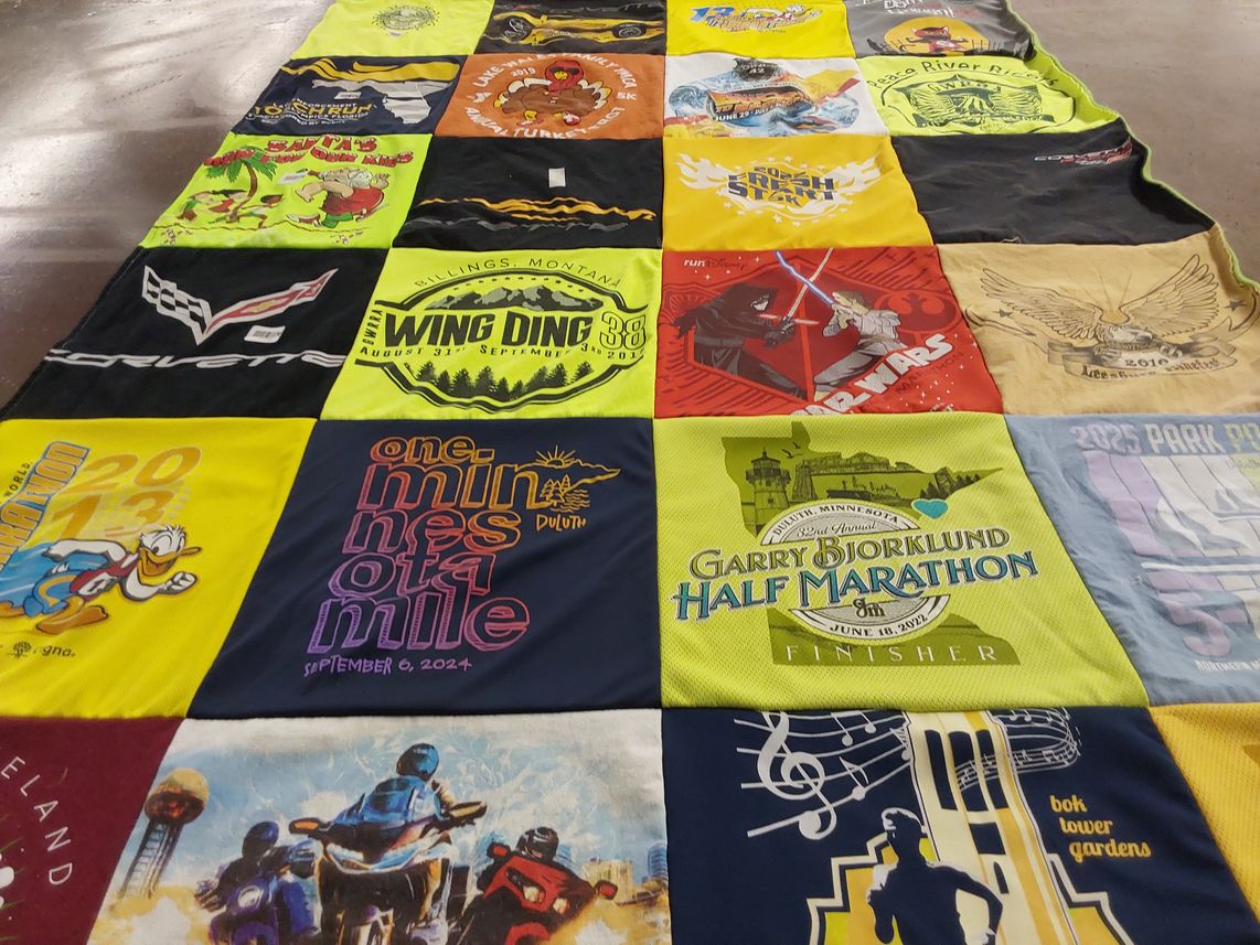 T-shirt quilt with running, marathons themes by Laura from MN