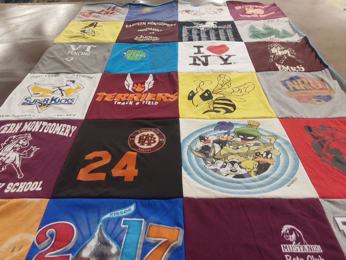 T-shirt quilt featuring nru soccer, terriers track and field by Tanya from VA